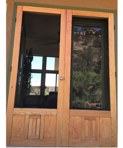 Model D801 Double Doors, with a built in Cat Flap, in Doug Fir Wood.